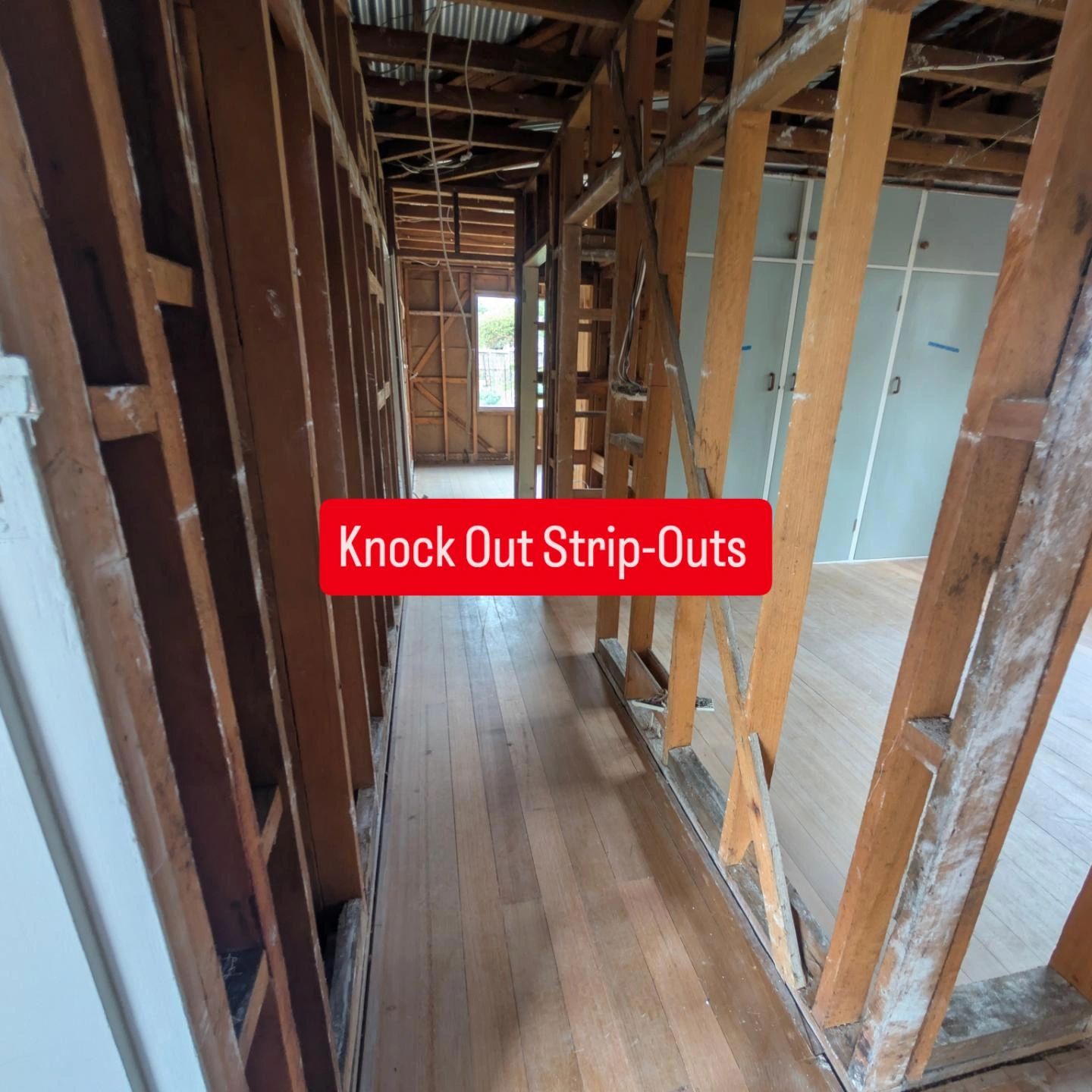 Hallway renovation with exposed framing